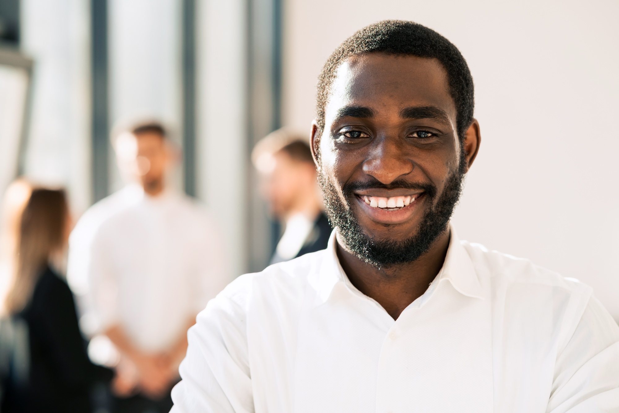 Smiling black man in office